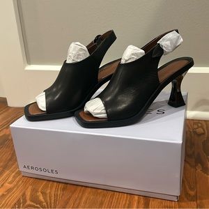 Aerosols NWT, size 9, black leather , back strap heels.
